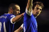 Everton's Leighton Baines (R) celebrates scoring in Liverpool on January 30, 2013